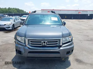 2013 Honda Ridgeline RTL with VIN 5FPYK1F5XDB012354, listed as a IAAI auction lot 42392921 with 248,223 mi miles and . Bid and sale history available at DreamBid. Image 12.