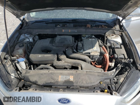 2013 Ford Fusion SE Hybrid z VIN 3FA6P0LU3DR336838, wystawiony jako Copart lot #56205445 z przebiegiem 209 164 mil mil oraz Czysty tytuł • Clean title. Historia ofert i sprzedaży dostępna na DreamBid. Obrazek 11.