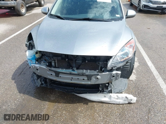 2012 Mazda 3 i Touring with VIN JM1BL1V71C1677133, listed as a IAAI auction lot 41991234 with 104,610 mi miles and . Bid and sale history available at DreamBid. Image 6.