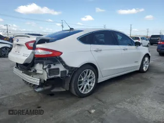 2016 Ford Fusion Titanium Hybrid with VIN 3FA6P0RU3GR144704, listed as a Copart auction lot 51850175 with 148,890 mi miles and Salvage Title. Bid and sale history available at carsss.com. Image 3.
