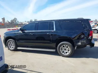 2019 Chevrolet Suburban LT with VIN 1GNSCJKCXKR332739, listed as a IAAI auction lot 41636530 with 104,997 mi miles and . Bid and sale history available at DreamBid. Image 14.