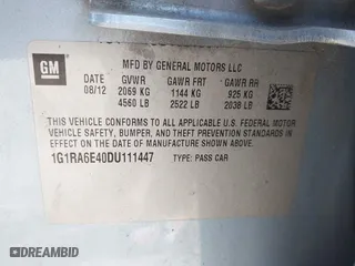 2013 Chevrolet Volt with VIN 1G1RA6E40DU111447, listed as a IAAI auction lot 41875712 with 304,466 mi miles. Bid and sale history available at carsss.com. Image 9.