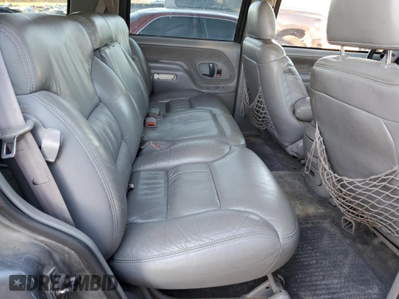 1999 GMC Yukon with VIN 1GKEK13R3XJ750307, listed as a Copart auction lot 84728104 with 212,879 mi miles and Salvage Title. Bid and sale history available at carsss.com. Image 12.