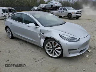 2018 Tesla Model 3 Long Range Battery with VIN 5YJ3E1EA8JF060682, listed as a Copart auction lot 47072985 with Not Provided miles and Salvage Title. Bid and sale history available at DreamBid. Image 4.