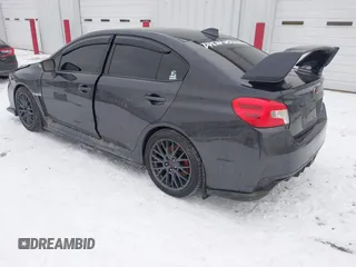 2015 Subaru WRX STI with VIN JF1VA2L60F9803514, listed as a IAAI auction lot 41591735 with 82,700 mi miles and . Bid and sale history available at DreamBid. Image 3.