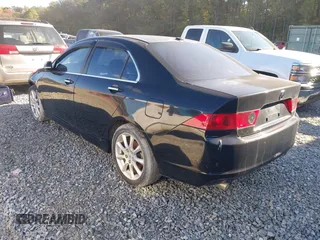2007 Acura TSX Navi with VIN JH4CL96927C014438, listed as a IAAI auction lot 40931679 with 202,967 mi miles and . Bid and sale history available at DreamBid. Image 3.