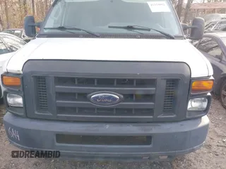 2011 Ford Econoline Cargo Commercial with VIN 1FTNE1EW3BDA96826, listed as a IAAI auction lot 41314002 with 408,264 mi miles and . Bid and sale history available at carsss.com. Image 6.