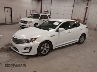 2014 Kia Optima LX with VIN KNAGM4AD2E5076063, listed as a IAAI auction lot 42014109 with 159,450 mi miles and . Bid and sale history available at DreamBid. Image 2.