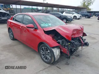 2022 Kia Forte LXS z VIN 3KPF24AD2NE427241, wystawiony jako IAAI lot #41240638 z przebiegiem 53 679 mil mil oraz . Historia ofert i sprzedaży dostępna na DreamBid. Obrazek 1.