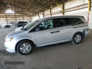 2014 Honda Odyssey LX z VIN 5FNRL5H2XEB123735, wystawiony jako Copart lot #57014735 z przebiegiem 110 731 mil mil oraz Szkoda całkowita • Salvage title. Historia ofert i sprzedaży dostępna na DreamBid. Obrazek 1.