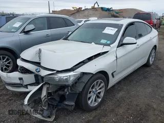 2014 BMW 3 Series GT 328i xDrive with VIN WBA3X5C5XED559713, listed as a IAAI auction lot 42078622 with 68,233 mi miles. Bid and sale history available at carsss.com. Image 2.