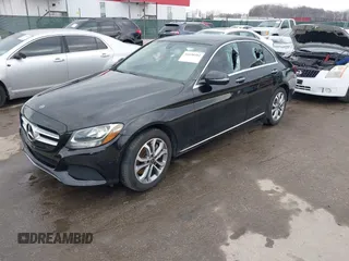 2018 Mercedes-Benz C 300 with VIN WDDWF4KB2JR341272, listed as a IAAI auction lot 41650381 with 74,216 mi miles and . Bid and sale history available at DreamBid. Image 2.
