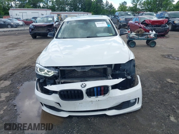 2013 BMW 3 Series 335i xDrive with VIN WBA3B9C59DJ899358, listed as a IAAI auction lot 42321863 with 127,700 mi miles and . Bid and sale history available at DreamBid. Image 12.