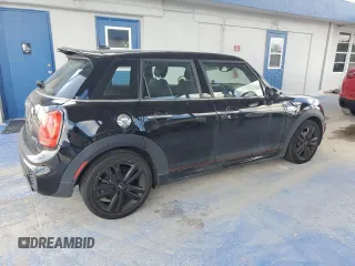 2018 MINI Hardtop 4 Door Cooper S with VIN WMWXU3C54J2F51176, listed as a Copart auction lot 64896135 with 16,418 mi miles and Salvage title. Bid and sale history available at DreamBid. Image 3.