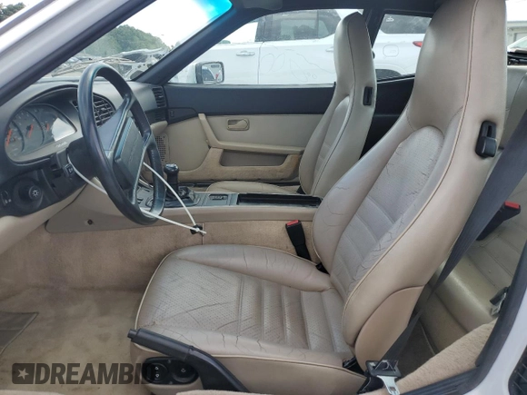 1987 Porsche 944 с VIN WP0AA094XHN450664, выставлен на аукционе Copart как лот 57918205 с пробегом 115 949 миль миль и Списание • Salvage title. История ставок и продаж доступна на DreamBid. Изображение 7.