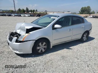 2009 Nissan Sentra 2.0 SL FE+ z VIN 3N1AB61E19L648459, wystawiony jako Copart lot #60982055 z przebiegiem 122 410 mil mil oraz Szkoda całkowita • Salvage title. Historia ofert i sprzedaży dostępna na DreamBid. Obrazek 1.