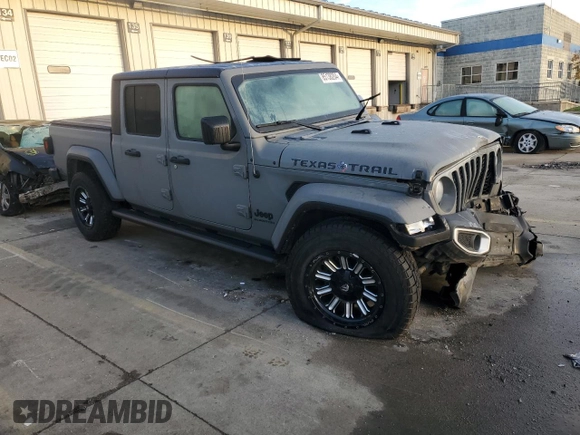 2022 Jeep Gladiator Willys с VIN 1C6HJTAG8NL107002, выставлен на аукционе Copart как лот 85138204 с пробегом 69 166 миль миль и Списание • Salvage title. История ставок и продаж доступна на DreamBid. Изображение 4.