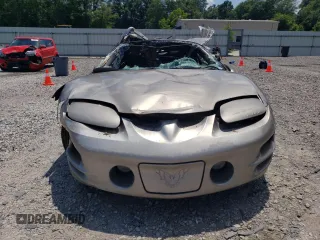 2001 Pontiac Firebird Formula z VIN 2G2FV22G312146995, wystawiony jako Copart lot #58705304 z przebiegiem Nie podano mil oraz Szkoda całkowita • Salvage title. Historia ofert i sprzedaży dostępna na DreamBid. Obrazek 5.