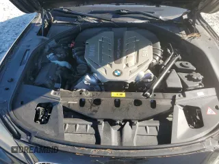 2011 BMW 7 Series with VIN WBAKX8C55BC198177, listed as a Copart auction lot 77016924 with 99,275 mi miles and Salvage title. Bid and sale history available at DreamBid. Image 11.
