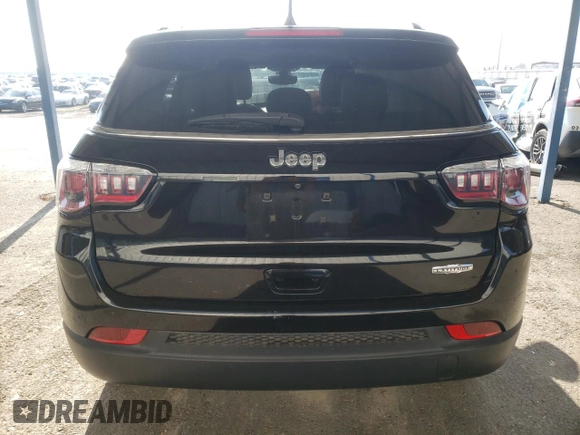 2019 Jeep Compass Latitude with VIN 3C4NJCBB1KT750032, listed as a Copart auction lot 82931994 with 59,293 mi miles and Salvage Title. Bid and sale history available at DreamBid. Image 6.