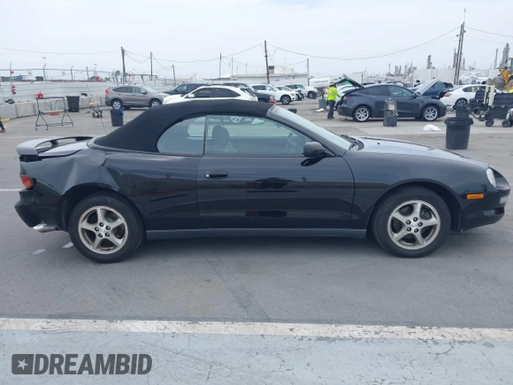1999 Toyota Celica GT z VIN JT5FG02T9X0056800, wystawiony jako IAAI lot #42374921 z przebiegiem 48 157 mil mil oraz . Historia ofert i sprzedaży dostępna na DreamBid. Obrazek 13.