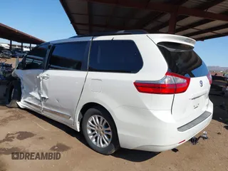 2015 Toyota Sienna XLE with VIN 5TDYK3DC8FS629577, listed as a IAAI auction lot 42019641 with 173,259 mi miles. Bid and sale history available at carsss.com. Image 3.