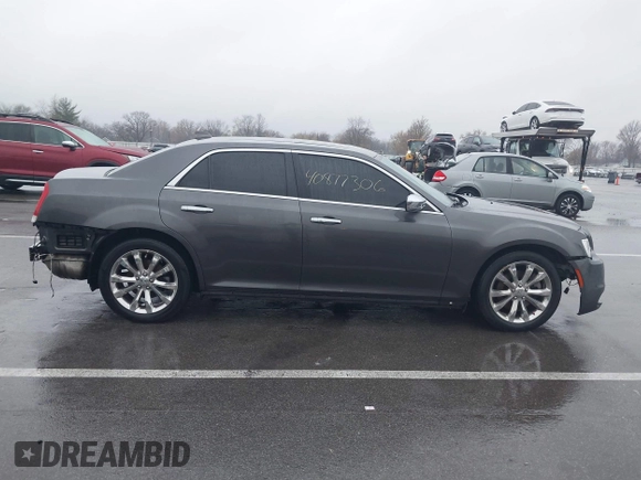 2016 Chrysler 300 with VIN 2C3CCAKG5GH334703, listed as a IAAI auction lot 40877306 with 141,799 mi miles. Bid and sale history available at carsss.com. Image 14.