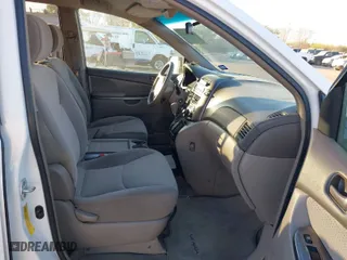 2007 Toyota Sienna CE with VIN 5TDZK23C57S079403, listed as a IAAI auction lot 41846147 with 244,090 mi miles. Bid and sale history available at carsss.com. Image 5.
