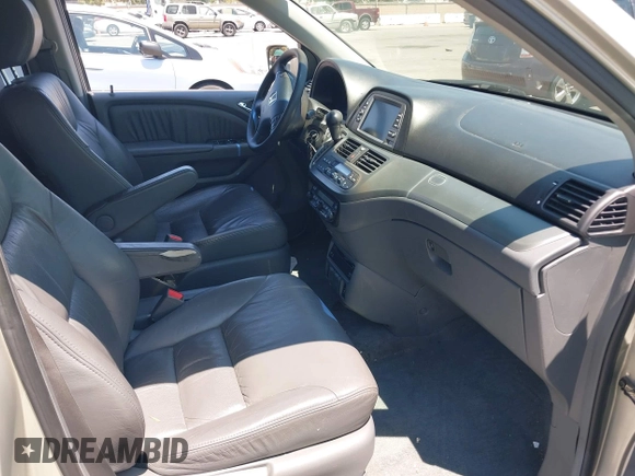 2005 Honda Odyssey EX-L with VIN 5FNRL38725B113815, listed as a IAAI auction lot 42754724 with 179,214 mi miles and . Bid and sale history available at DreamBid. Image 5.