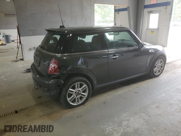 2013 MINI Hardtop S with VIN WMWSV3C57DT396593, listed as a Copart auction lot 53610125 with 116,193 mi miles and Salvage Title. Bid and sale history available at DreamBid. Image 3.