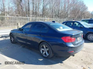 2013 BMW 3 Series 320i with VIN WBA3B1C5XDF461582, listed as a IAAI auction lot 41644855 with 159,363 mi miles. Bid and sale history available at carsss.com. Image 3.