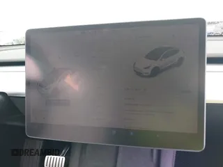 2022 Tesla Model Y Performance with VIN 7SAYGDEF1NF456829, listed as a IAAI auction lot 41448425 with 41,380 mi miles and . Bid and sale history available at DreamBid. Image 16.