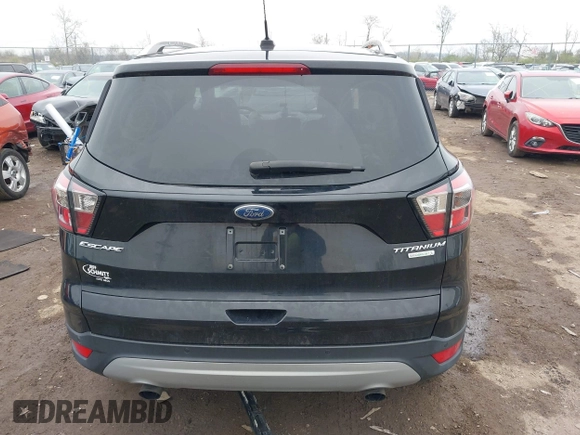 2017 Ford Escape Titanium with VIN 1FMCU0J95HUD37858, listed as a IAAI auction lot 41984629 with 87,163 mi miles and . Bid and sale history available at DreamBid. Image 15.