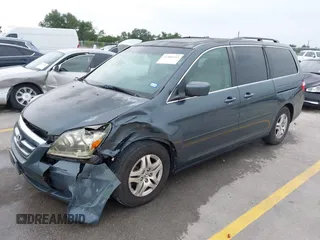 2005 Honda Odyssey EX-L with VIN 5FNRL38775B110232, listed as a IAAI auction lot 42301513 with 277,389 mi miles and . Bid and sale history available at DreamBid. Image 2.