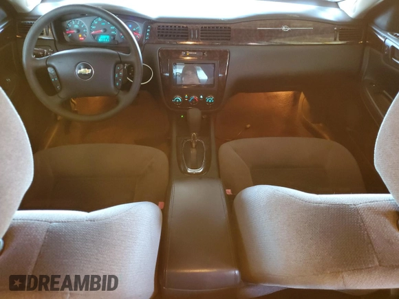 2015 Chevrolet Impala LS with VIN 2G1WA5E37F1158008, listed as a Copart auction lot 61977635 with 106,437 mi miles and Salvage title. Bid and sale history available at DreamBid. Image 8.