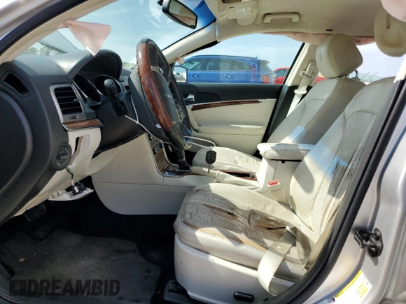 2012 Lincoln MKZ with VIN 3LNHL2GC9CR813164, listed as a Copart auction lot 56974105 with 103,830 mi miles and Salvage title. Bid and sale history available at DreamBid. Image 7.