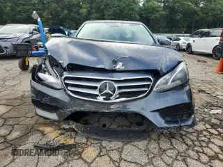 2014 Mercedes-Benz E 350 Sport with VIN WDDHF5KBXEA872156, listed as a Copart auction lot 60892695 with 166,555 mi miles and Salvage title. Bid and sale history available at DreamBid. Image 5.