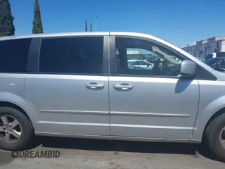 2012 Dodge Grand Caravan SXT with VIN 2C4RDGCG7CR204835, listed as a IAAI auction lot 41948688 with 125,466 mi miles and . Bid and sale history available at DreamBid. Image 13.
