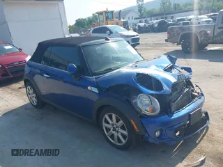 2013 MINI Convertible S with VIN WMWZP3C5XDT705613, listed as a IAAI auction lot 42392748 with 87,477 mi miles and . Bid and sale history available at DreamBid. Image 1.