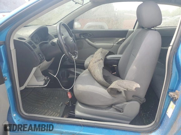 2007 Ford Focus S z VIN 1FAFP31N77W138844, wystawiony jako Copart lot #60702195 z przebiegiem Nie podano mil oraz Czysty tytuł • Clean title. Historia ofert i sprzedaży dostępna na DreamBid. Obrazek 7.