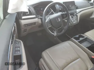 2023 Honda Odyssey Touring z VIN 5FNRL6H83PB006964, wystawiony jako Copart lot #89400635 z przebiegiem 29 254 mil mil oraz Szkody całkowita. Historia ofert i sprzedaży dostępna na DreamBid. Obrazek 8.