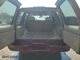 1999 GMC Denali with VIN 1GKEK13RXXR910328, listed as a Copart auction lot 71494384 with 251,016 mi miles and Salvage Title. Bid and sale history available at carsss.com. Image 6.