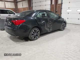 2017 Toyota Corolla L with VIN 2T1BURHEXHC747351, listed as a IAAI auction lot 42005758 with 94,366 mi miles and . Bid and sale history available at DreamBid. Image 4.