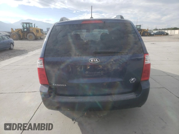 2009 Kia Sedona LX with VIN KNDMB233196304400, listed as a Copart auction lot 70311604 with 0 mi miles and Salvage Title. Bid and sale history available at carsss.com. Image 6.