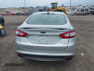 2016 Ford Fusion Titanium with VIN 3FA6P0K93GR117587, listed as a IAAI auction lot 42079701 with 142,105 mi miles. Bid and sale history available at carsss.com. Image 16.