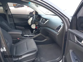 2018 Hyundai Tucson SEL with VIN KM8J33A47JU768935, listed as a IAAI auction lot 41007821 with 125,678 mi miles. Bid and sale history available at carsss.com. Image 5.