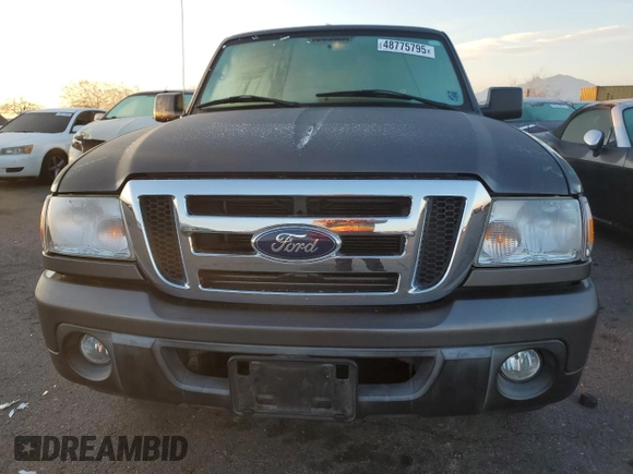 2010 Ford Ranger XLT with VIN 1FTKR4EE2APA08460, listed as a Copart auction lot 48775795 with 575,330 mi miles and Salvage title. Bid and sale history available at DreamBid. Image 5.