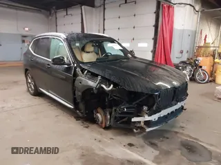 2021 BMW X3 xDrive30i with VIN 5UXTY5C09M9E77981, listed as a IAAI auction lot 41965697 with 61,723 mi miles and . Bid and sale history available at DreamBid. Image 1.