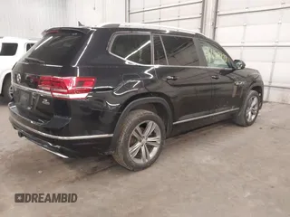 2018 Volkswagen Atlas SEL z VIN 1V2RR2CAXJC548261, wystawiony jako IAAI lot #41650478 z przebiegiem 123 399 mil mil oraz . Historia ofert i sprzedaży dostępna na DreamBid. Obrazek 4.