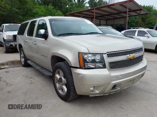 2013 Chevrolet Suburban LT with VIN 1GNSKJE74DR166223, listed as a IAAI auction lot 42172184 with 200,901 mi miles and . Bid and sale history available at DreamBid. Image 6.